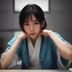 摄影美学编辑陈光远的工作照，专注于摄影师风格分析与写真美学解读